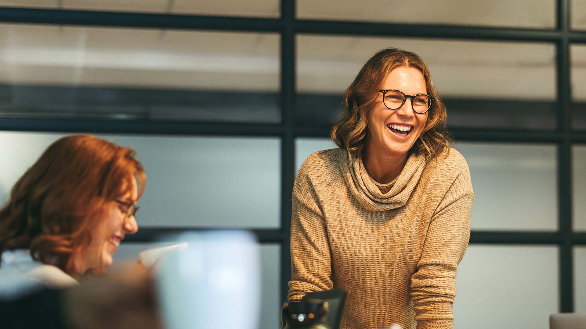 Woman smiling in meeting