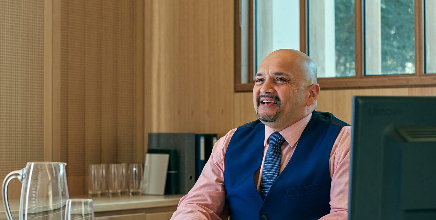 Man sitting at work desk