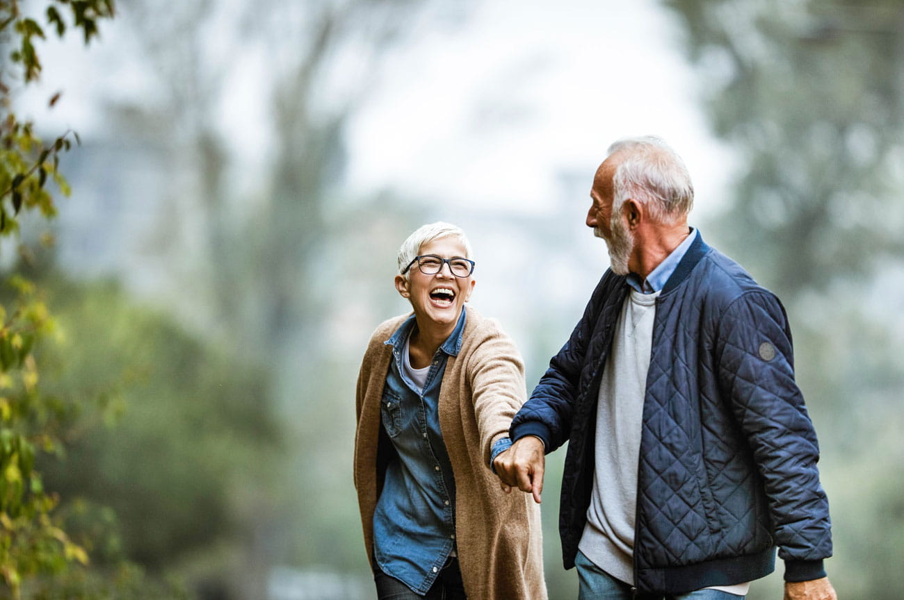 Couple smiling and walking together