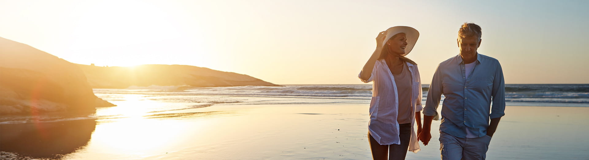 Couple walking on the beach