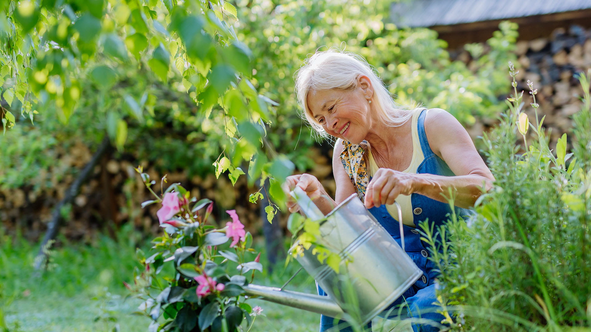 Woman smiling while gardening