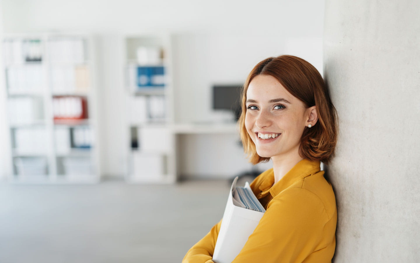 Young professional woman in office